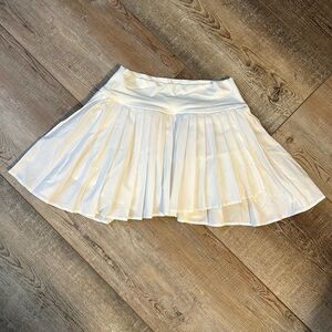 White pleated skort